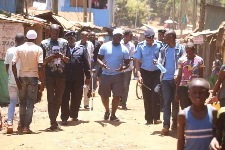 Police and community walking patrol together
